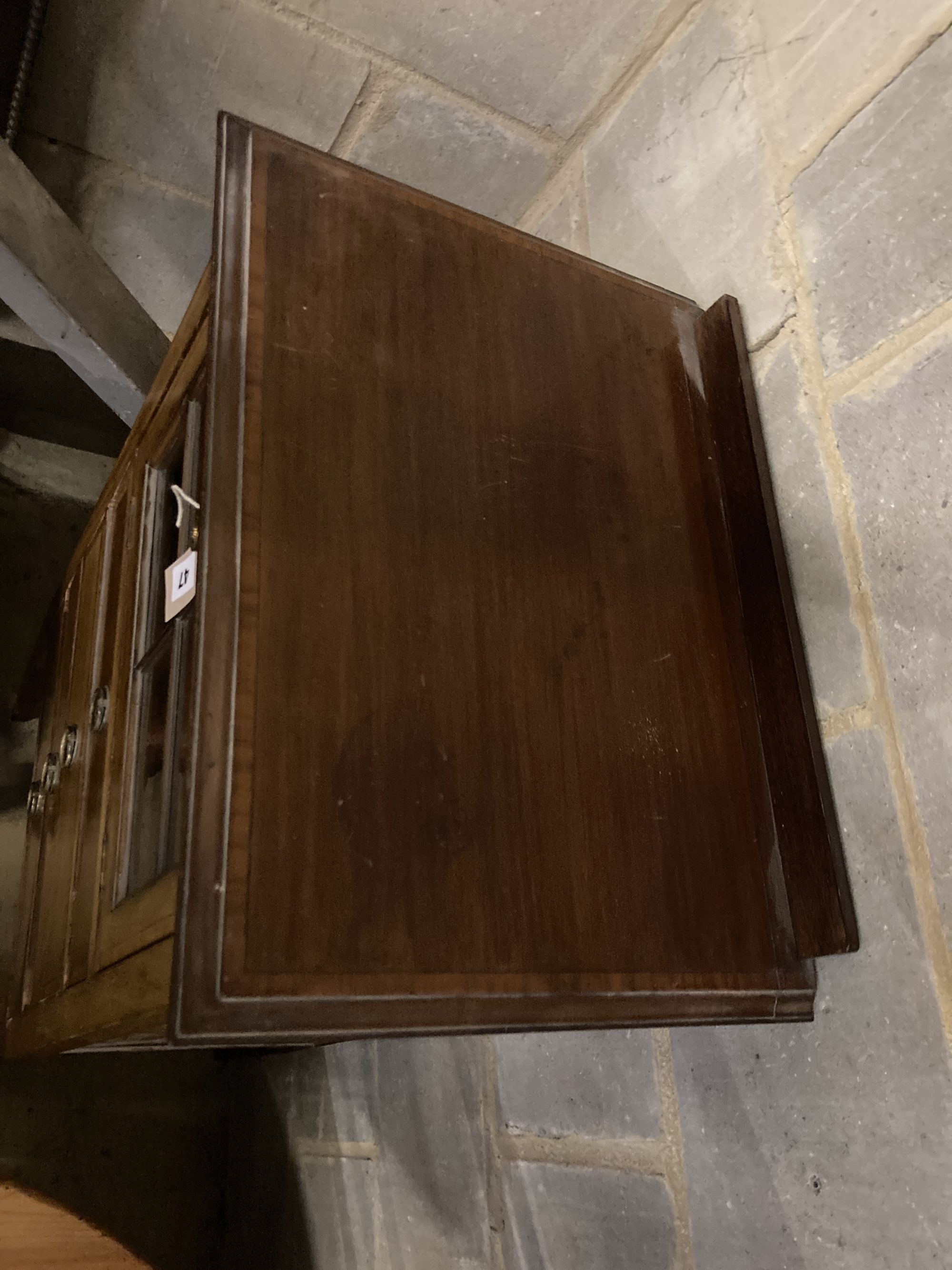 An Edwardian satinwood banded mahogany music cabinet, width 53cm depth 37cm height 108cm